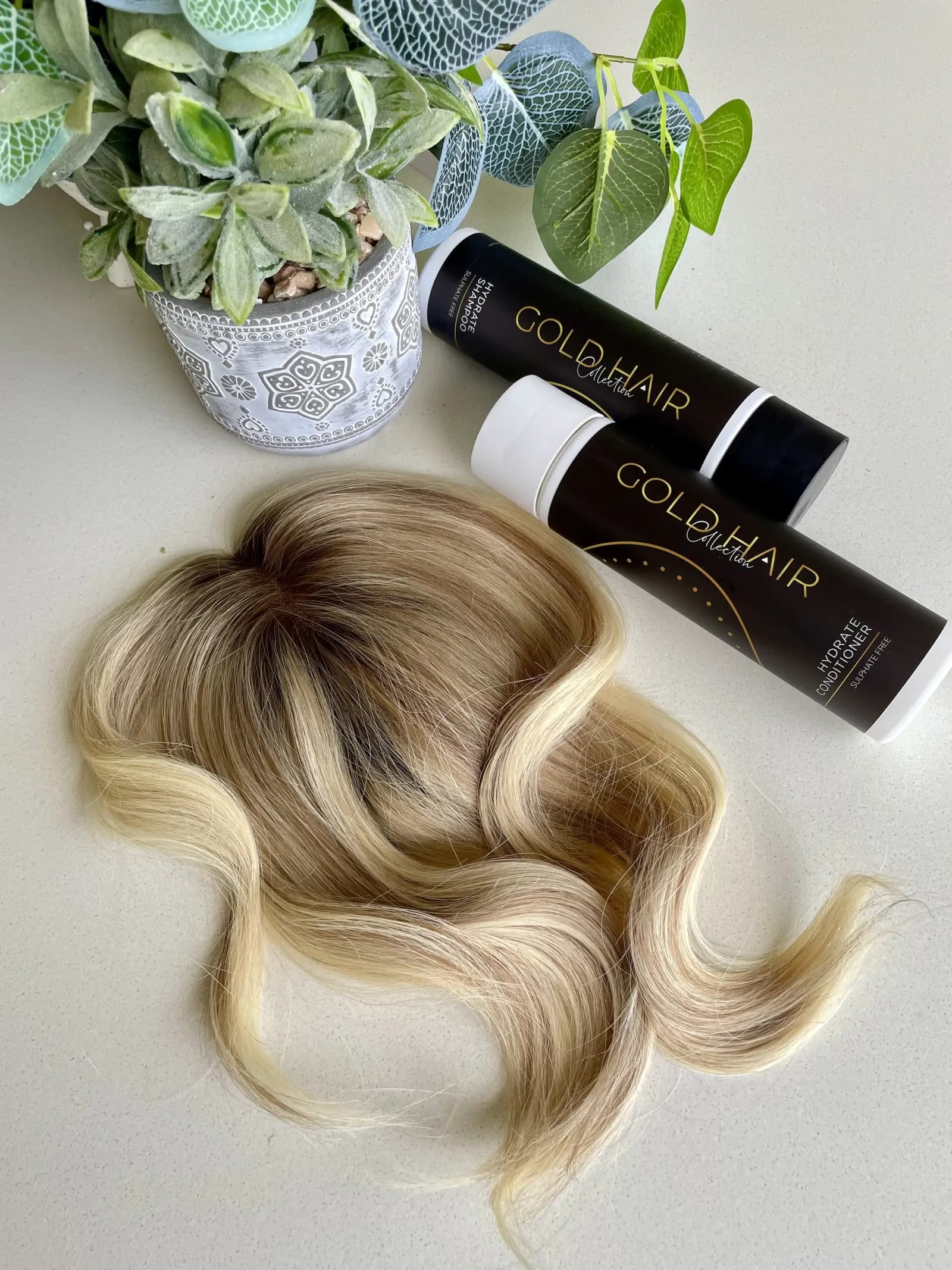 Premium hair topper with care products