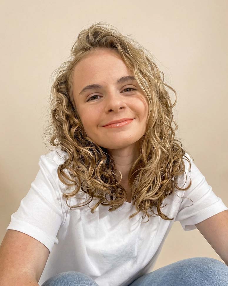 Healthy, vibrant curls styled to last between visits.