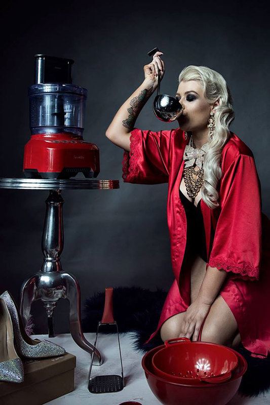 A woman in red robe, drinking
