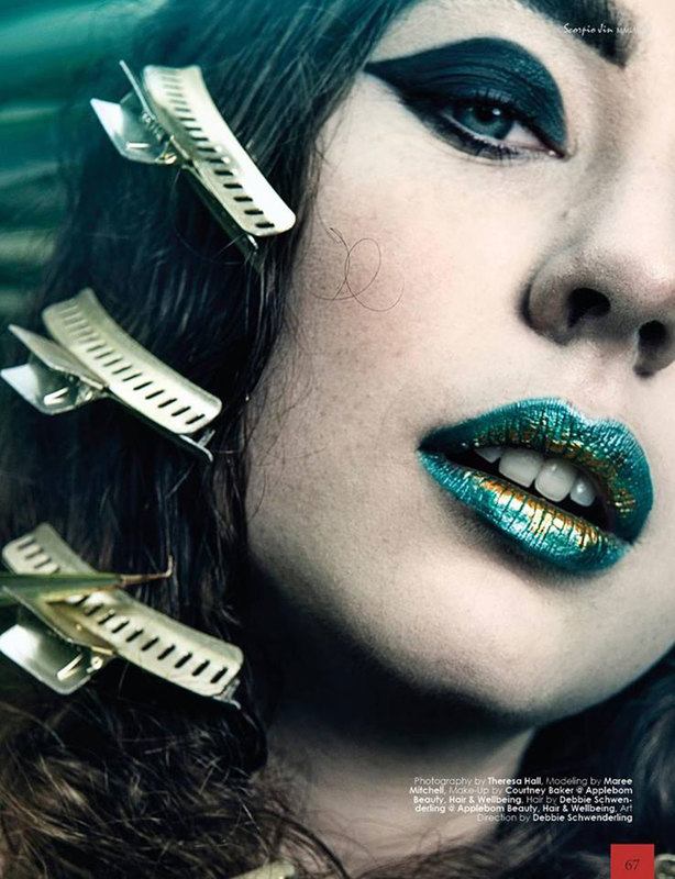 A close up of a woman with large hair pins attached to her hair.