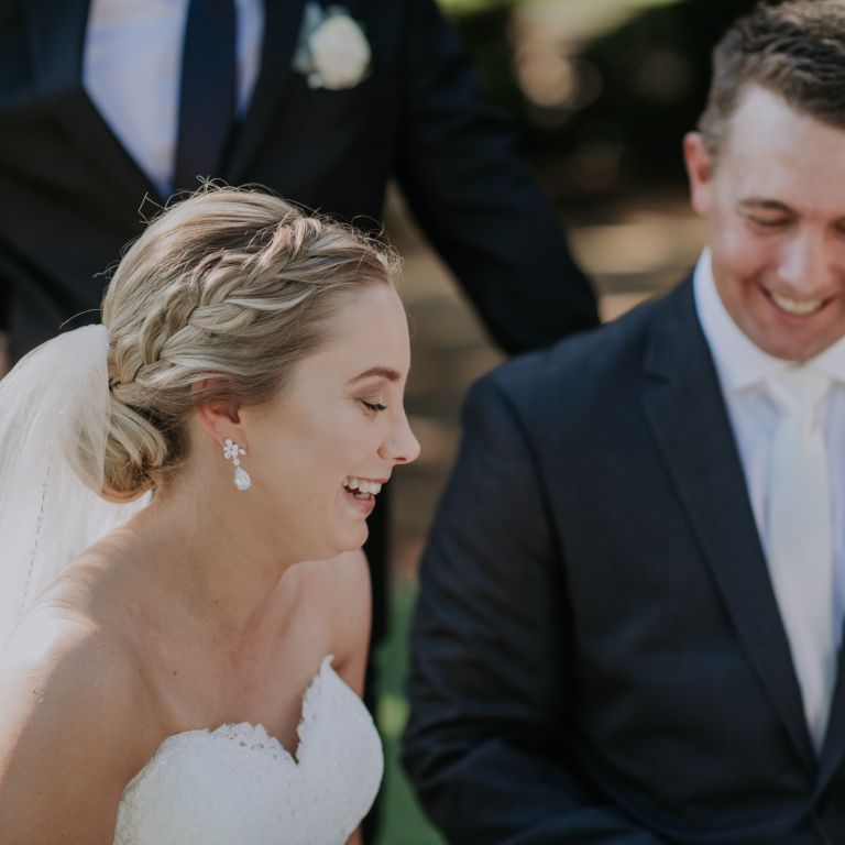A woman and a man smiling