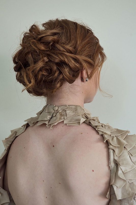 A woman facing the back